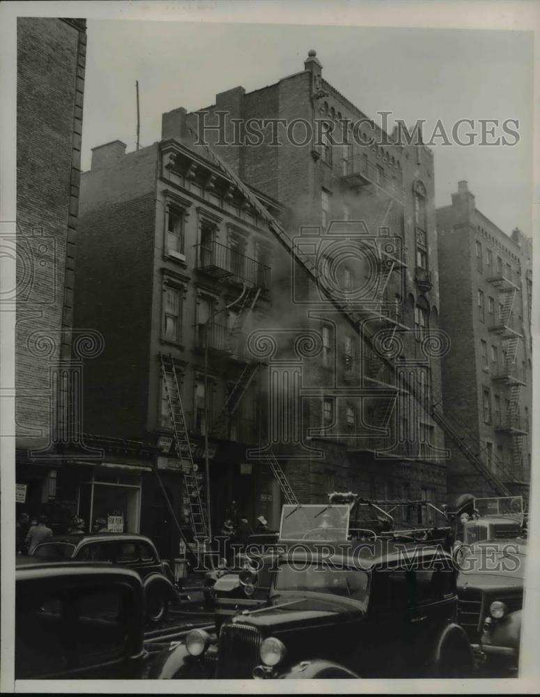 1940 Press Photo of fire that was caused by oil burner. - nee36613 - Historic Images