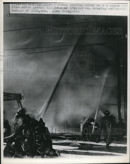 1948 Press Photo Firemen pour water on 4 alarm fire - nee33433 - Historic Images