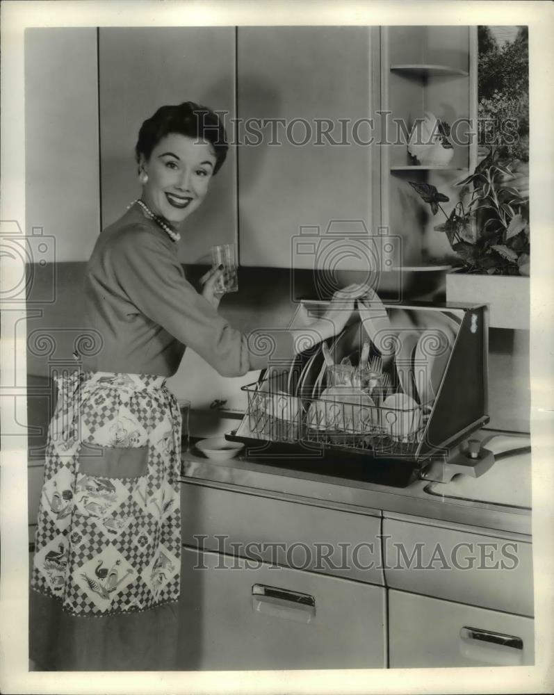 1958 Press Photo Woman Loads Chico Portomatic Dishwasher Rack - nee35991 - Historic Images