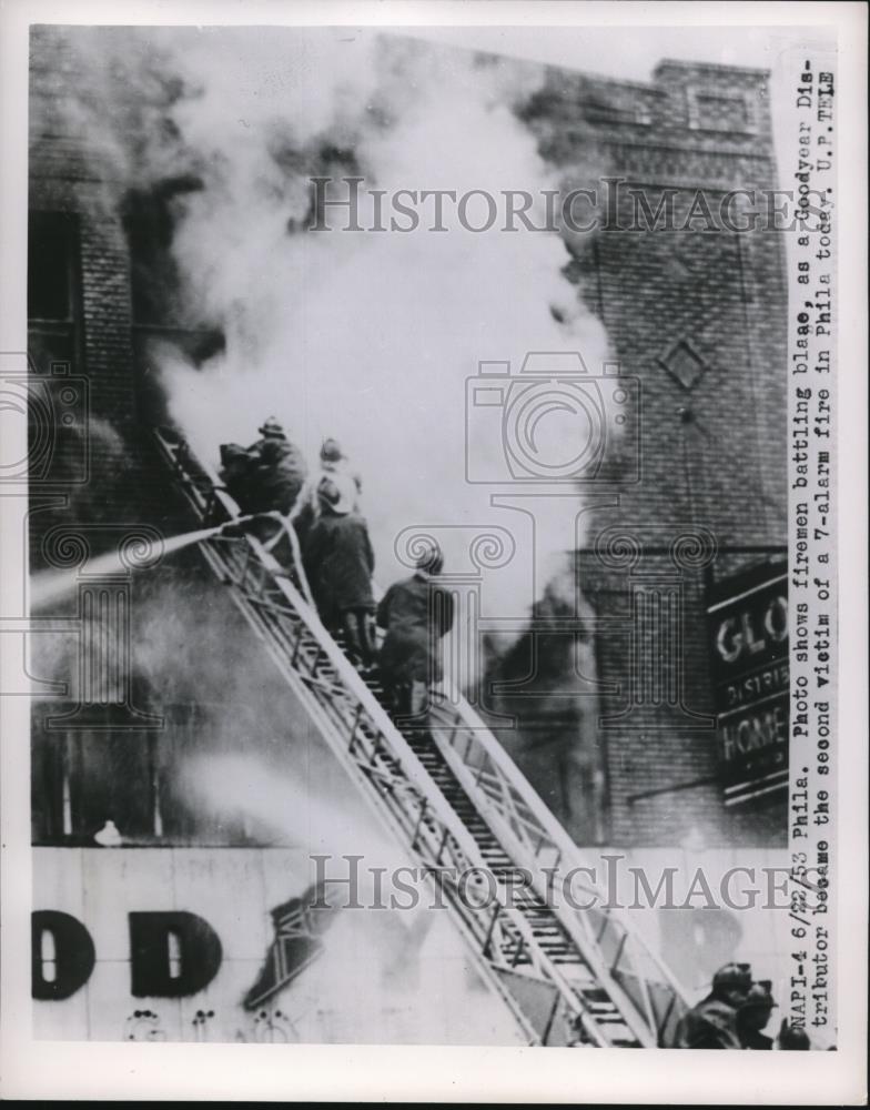 1953 Press Photo Firemen Battling Blaze at Goodyear Distributor - nee33151 - Historic Images