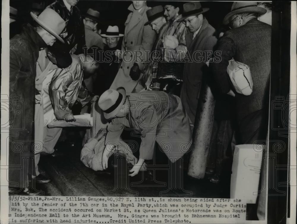 1952 Press Photo Mrs Lillian Genges aided after hit by car fender in Royal Party - Historic Images