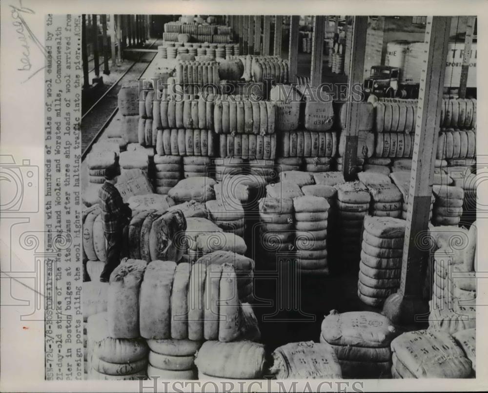 1951 Press Photo of a warehouse in Boston, Massachusetts filled with bales of - Historic Images