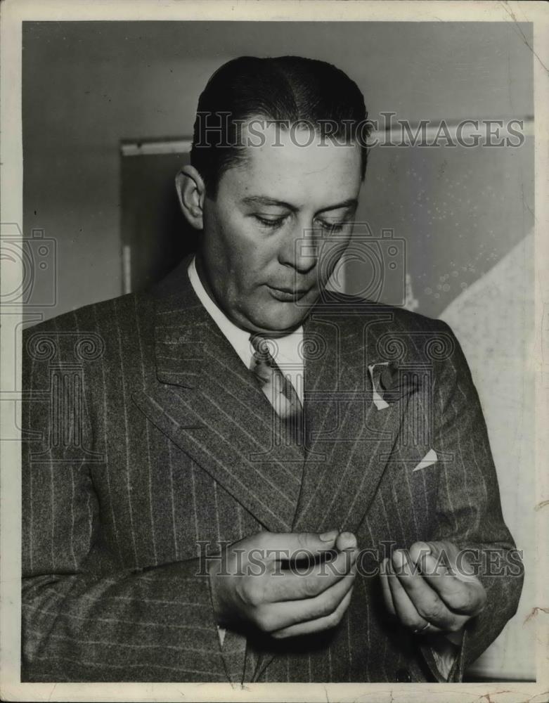 1939 Press Photo Captain Michael Blackwell Holding Something in Hands - Historic Images