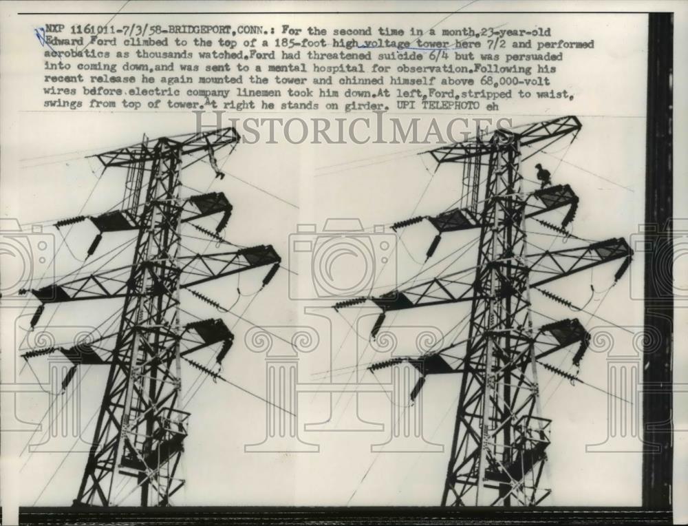 1958 Press Photo Edward Ford climbs top of high volt tower, performs acrobatics - Historic Images