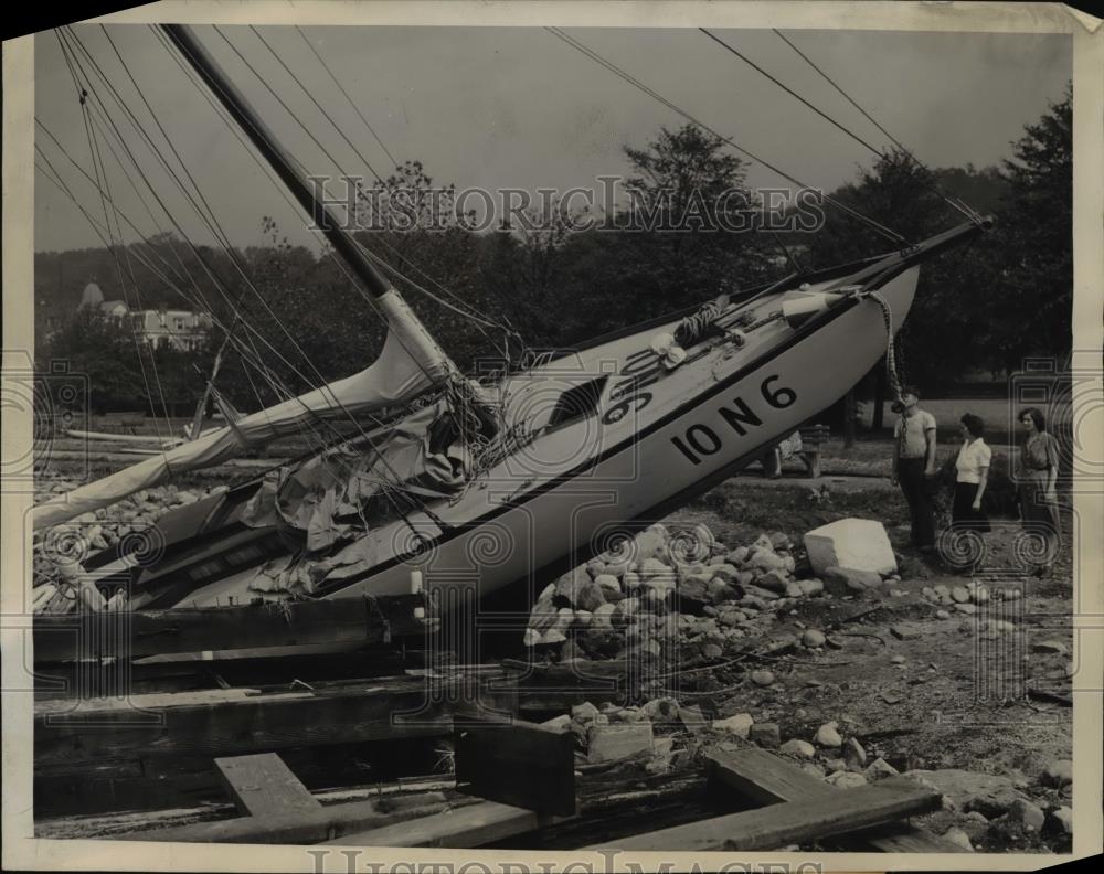 1944 Press Photo Hurricane wreckage, boat on land in Northport Long Island - Historic Images