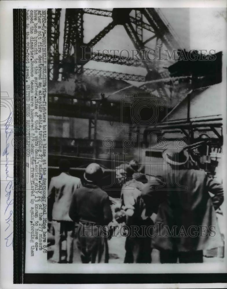 1956 Press Photo fire fighters battle blaze at Amercouer Coal Mine, Belgium - Historic Images