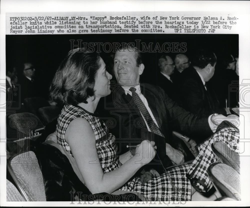 1967 Press Photo Mrs. Happy Rockefeller listens to husband Nelson Testify Albany - Historic Images