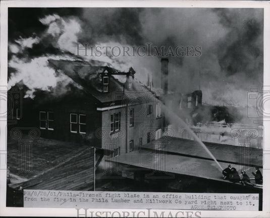 1951 Press Photo Firemen Fight Phila Lumber and Millwork Co. yard - nee47929 - Historic Images