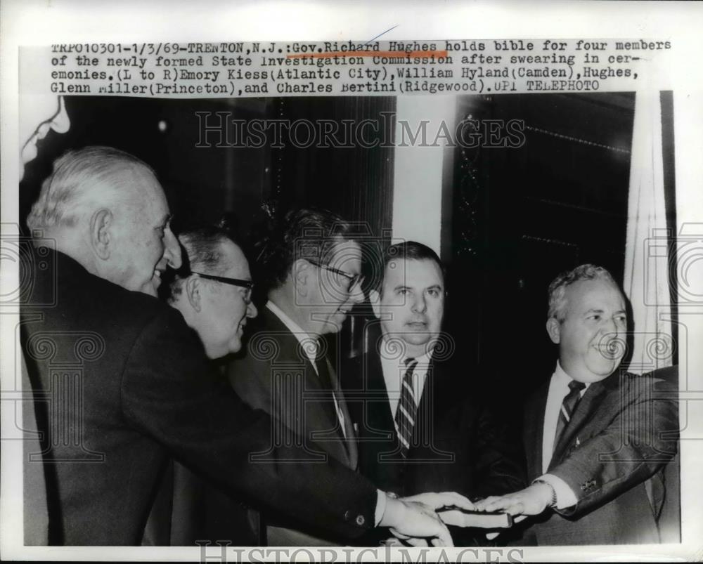 1969 Press Photo Trenton NJ Gov. Richard Hughes holds Bible for swearing in. - Historic Images