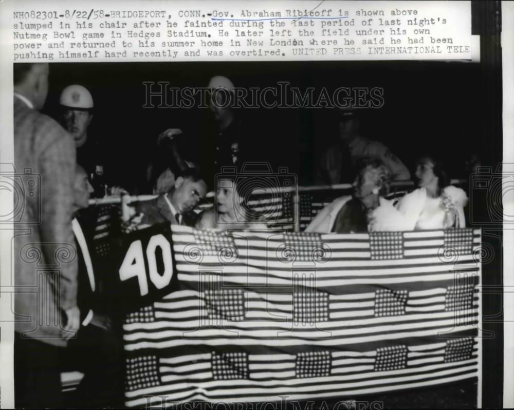 1958 Press Photo Bridgeport Conn Gov Abraham Ribicoff shown slumped in chair. - Historic Images