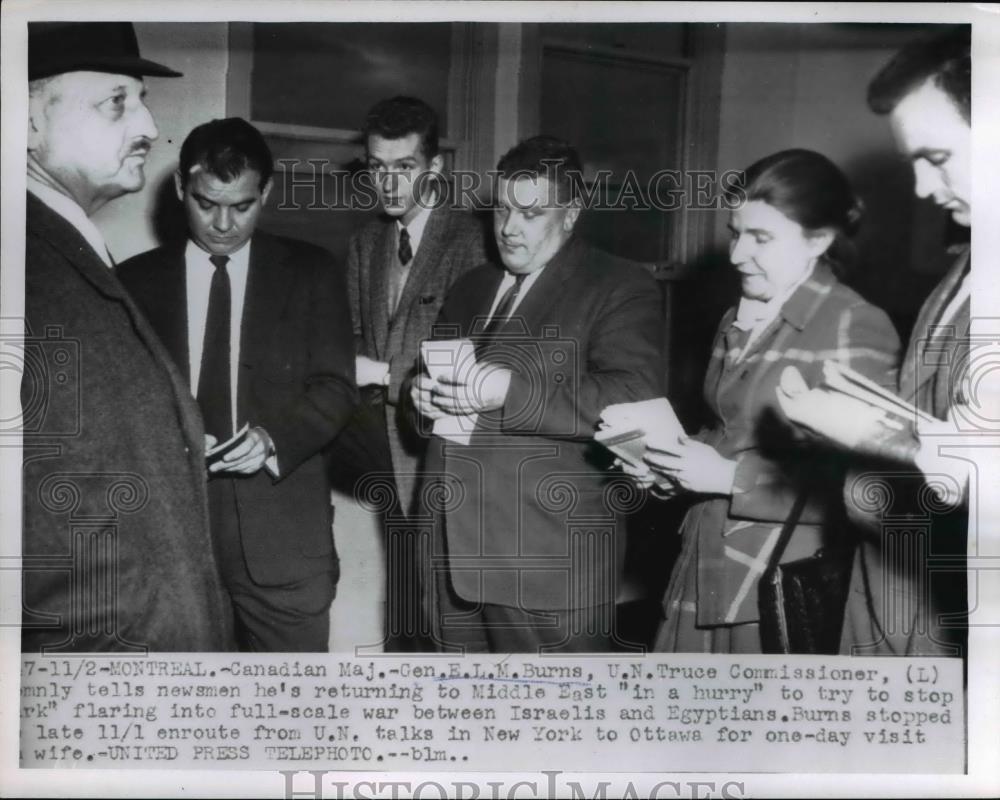 1955 Press Photo Major Gen. E.L.M. Burns, United Nations Commissioner, Reporters - Historic Images
