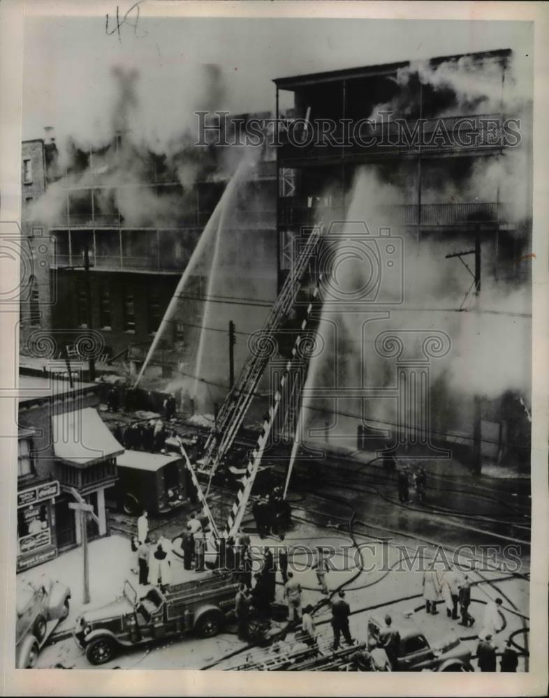 1951 Press Photo Firemen Fight Blaze at Roman Catholic Orphaniage in Montreal - Historic Images