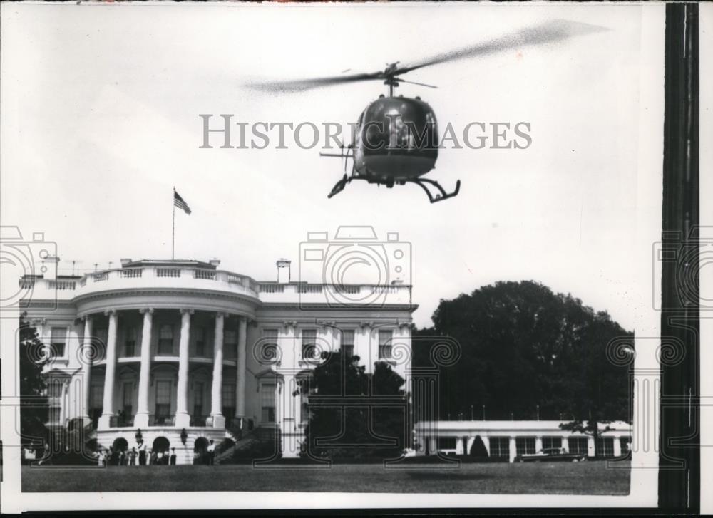 1957 Press Photo Washington DC -A helicopter takes off from lawn of White House. - Historic Images