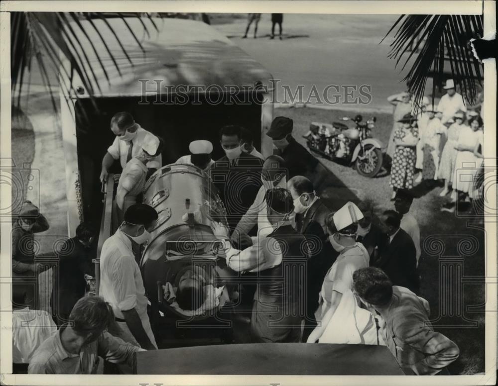 1937 Press Photo Fred B Snite Jr. Infantile Paralysis victim arrived in Miama. - Historic Images