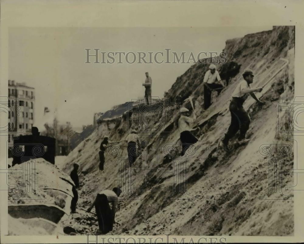 1941 Press Photo Workmen Demolish Ancient Fortifications of Paris - nee52724 - Historic Images