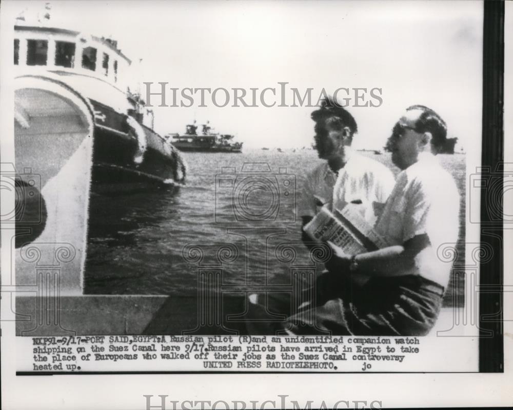 1956 Press Photo Port Said Egypt Russian boat pilot &amp; companion at Suez Canal - Historic Images