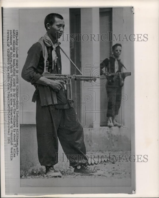 1961 Press Photo Militiamen with guns on guard at My Quoi. - Historic Images