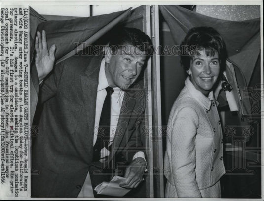 1966 Press Photo Actor Ronald Reagam and wife nancy enter voting booths at L.A - Historic Images