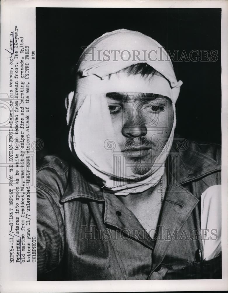 1952 Press Photo Sgt John N Peterson in shock after suffering wounds from an - Historic Images