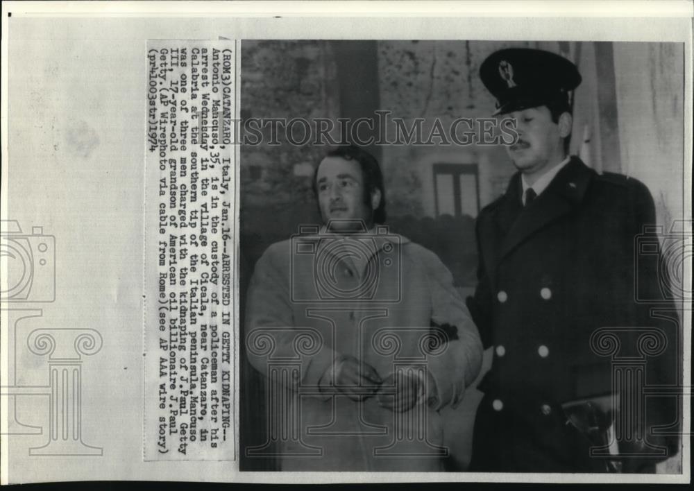 1974 Wire Photo Antonio Mancuso in policeman custody arrested in Cicala - Historic Images