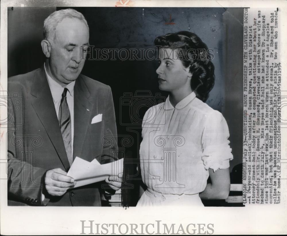 1954 Wire Photo Susan Hayes, Medical techinician and Dist. Atty. Ernest Roll. - Historic Images