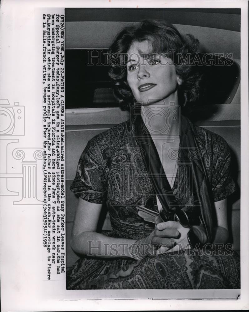 1958 Wire Photo Actress-model Suzy Parker leaves Hospital for special surgery. - Historic Images