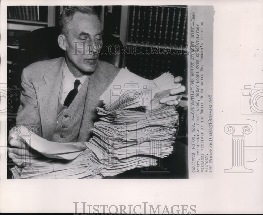 1948 Wire Photo Eben Ayers looks over congratulatory messages received - Historic Images