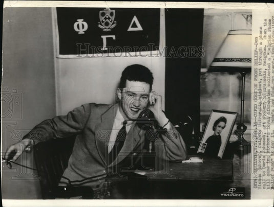 1937 Wire Photo Don Richon, Colgate University student put through a phone - Historic Images