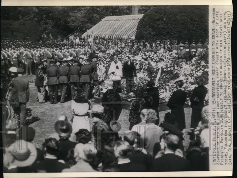 1945 Wire Photo Bearers composed of two men from each service carry casket - Historic Images