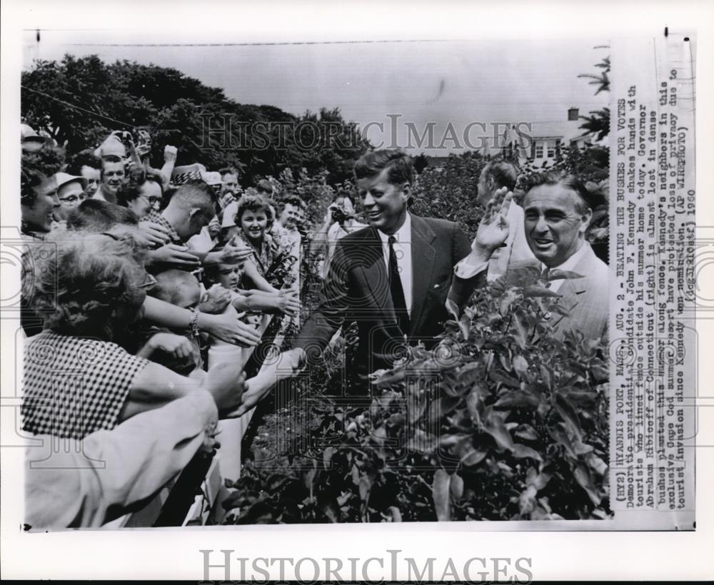 1960 Wire Photo Presidential candidate John Kennedy shakes hands with tourists - Historic Images