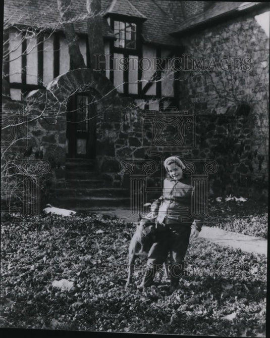 1954 Wire Photo Rebecca Plays with Pet Boxer in front of Their House - Historic Images