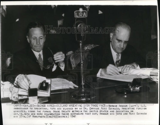 1941 Wire Photo Norman Armour, US Ambassador to Argentina, puts his glasses - Historic Images