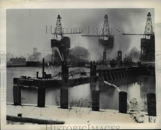 1942 Press Photo Four Alarm Fire Destroys Coal Wharf in Boston Massachusetts - Historic Images