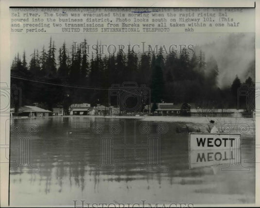 1960 Press Photo Eureka California Weott town sign in floodwaters of Eel river - Historic Images
