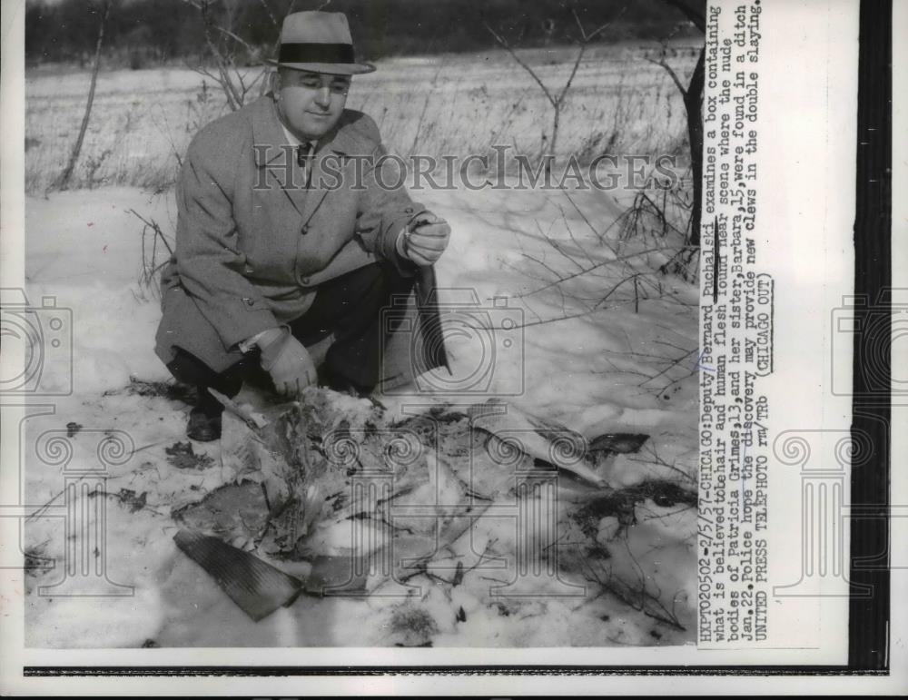 1957 Press Photo Deputy Bernard Puchalski With Box Containing Human Flesh - Historic Images