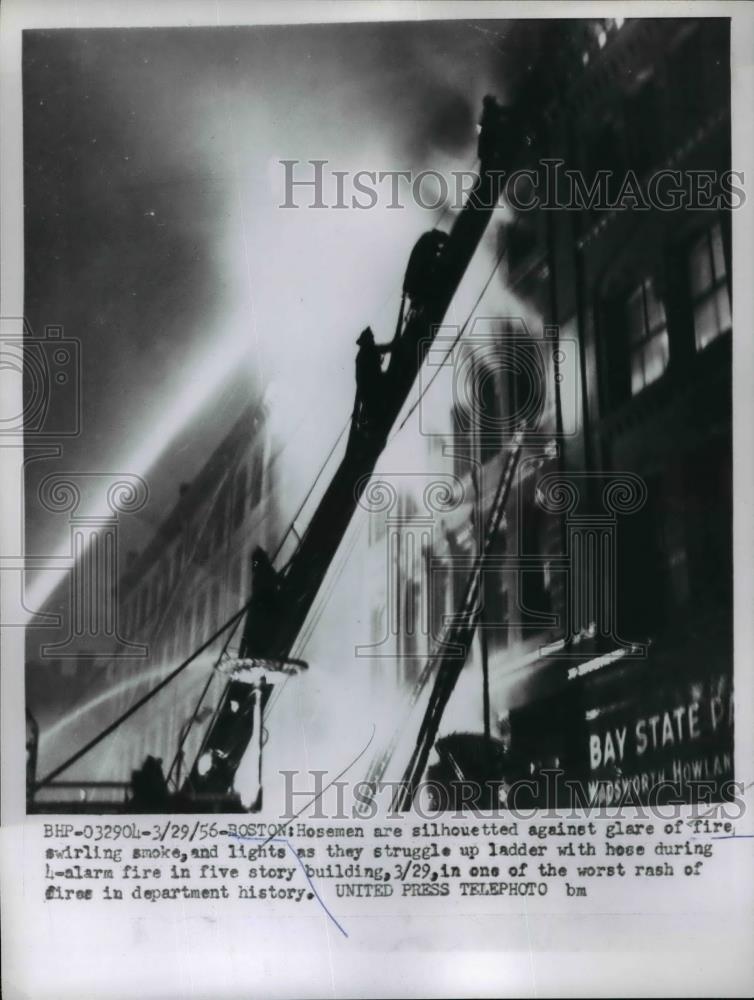 1956 Press Photo Boston firemen at 4 alarm fire at 5 story building - Historic Images