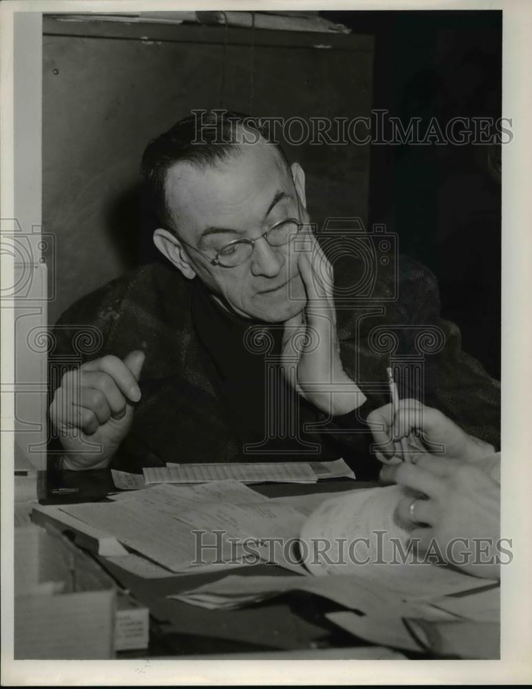 1953 Press Photo Thomas C Kopriwski doing income tax. - Historic Images