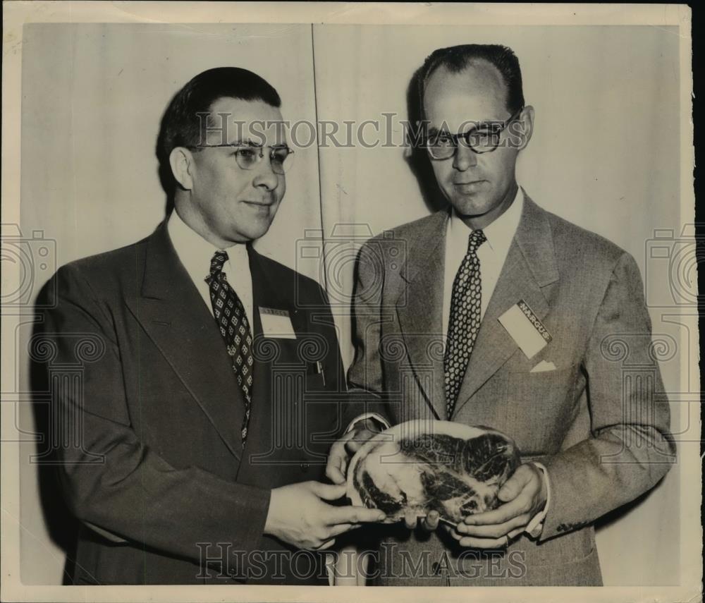 1951 Press Photo Clifford G.Bowes, Dir. of Meats Div. present meat to E.F.Phelps - Historic Images