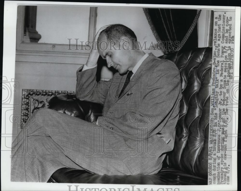 1961 Press Photo Senator William Proxmire relaxing on a couch after filibuster - Historic Images