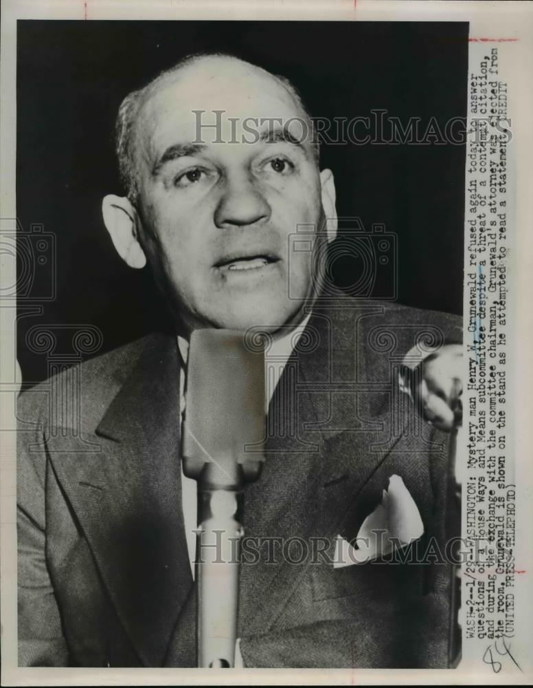 1952 Press Photo Henry Grunewald refused to answer questions despite threat. - Historic Images