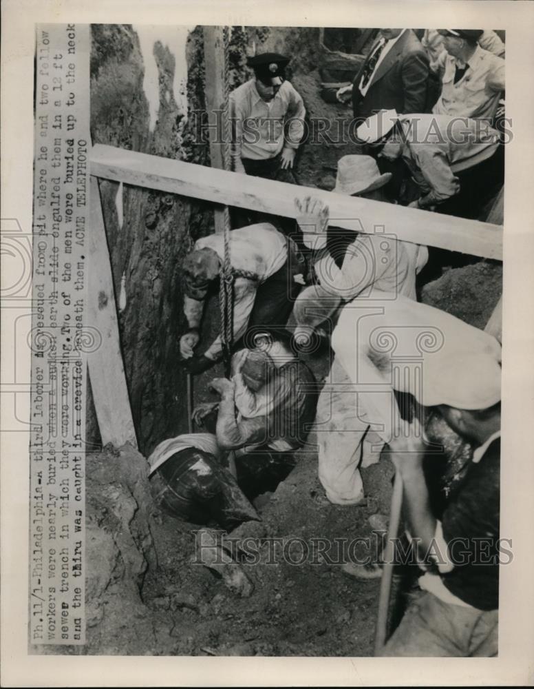 1950 Press Photo Workers Rescued from Pit After Landslide, Philadelphia - Historic Images