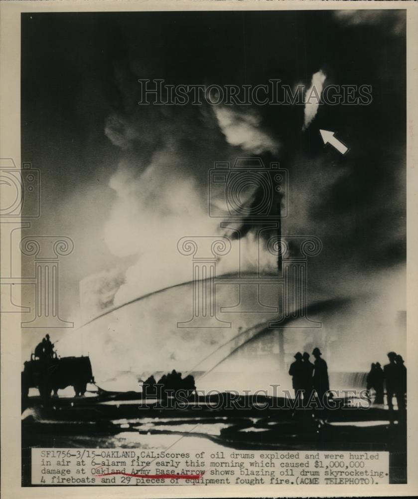 1949 Press Photo Oil drums exploded and hurled into the air, Oakland California - Historic Images