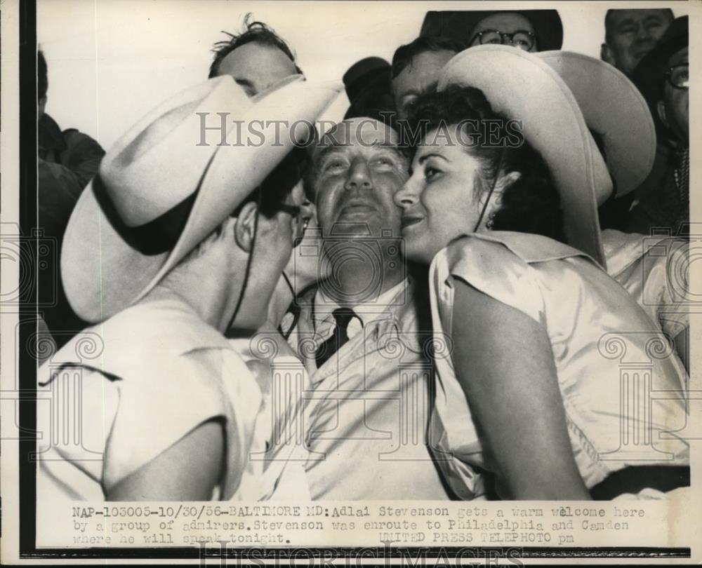1956 Press Photo Adlai Stevenson gets a warm welcome by a group of admirers. - Historic Images