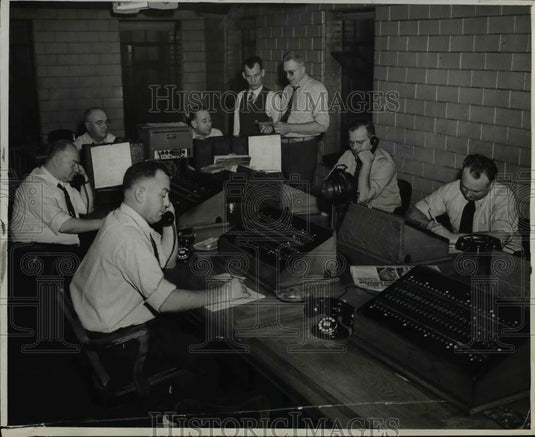 1941 Press Photo Policemen operating Police radio - cva75619 - Historic Images