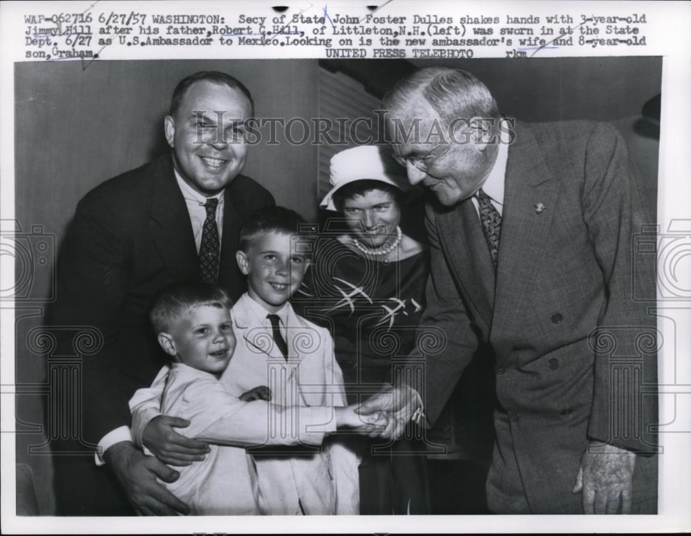 1957 Press Photo Sec of State John Foster Dulles shaking hands with a little boy - Historic Images