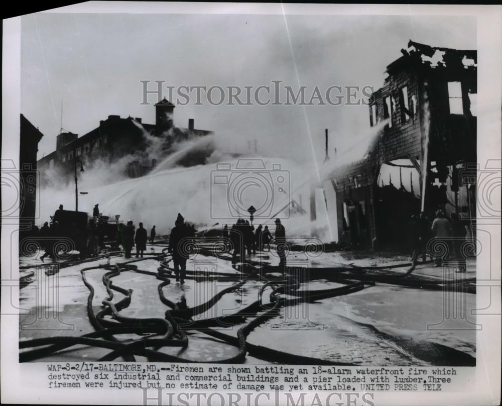 1953 Press Photo Firemen battling on Fire at the Commericial Area in Baltimore. - Historic Images