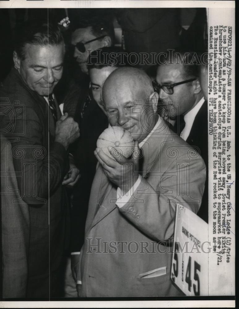 1959 Press Photo Ambassador Henry Cabot Lodge Holding Cantaloupe - Historic Images