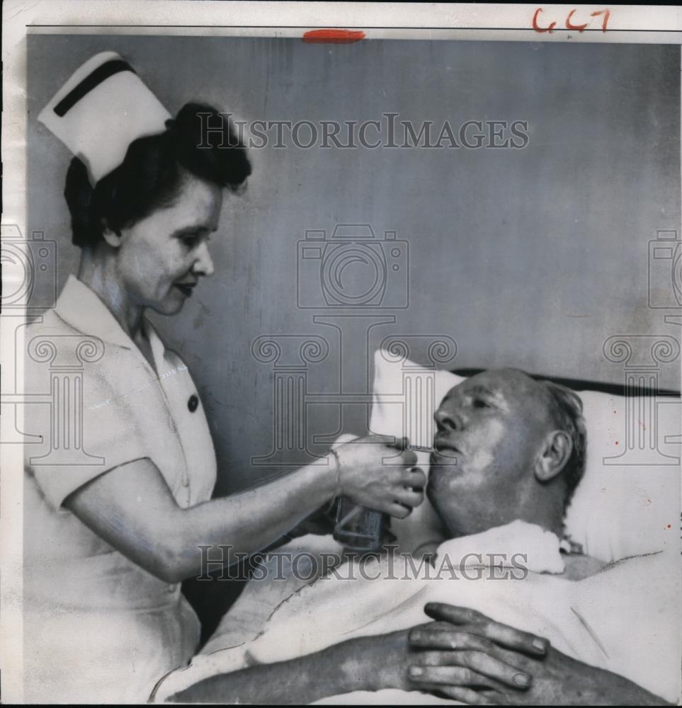 1958 Press Photo Dr. Charles A. Olson, RN Eleanor Manteufel recovers from - Historic Images