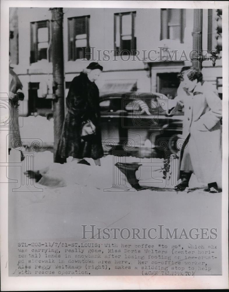 1951 Press Photo Woman Slips &amp; Falls on Icy Sidewalk, St. Louis Missouri - Historic Images