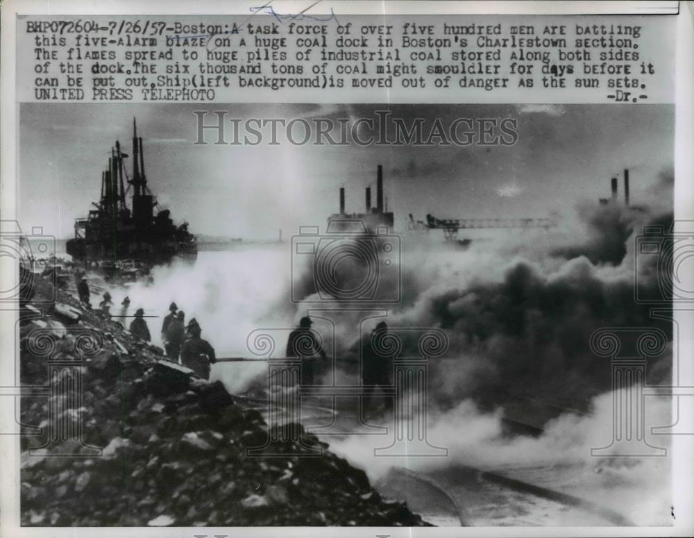 1957 Press Photo Five-alarm blaze on a huge coal dock in Boston&#39;s Charleston. - Historic Images